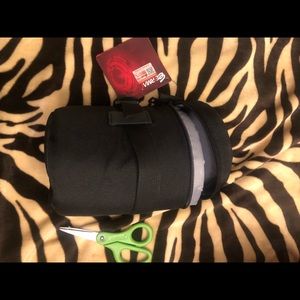 PADDED CAMERA LENS PROTECTOR WITH BELT ATTACHMENT